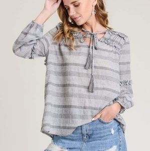 RUFFLE BLOUSE WITH DRAWSTRING